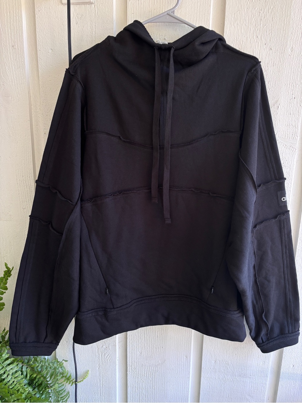 ALO Yoga Black Pullover Hoodie with Layered Seam Details